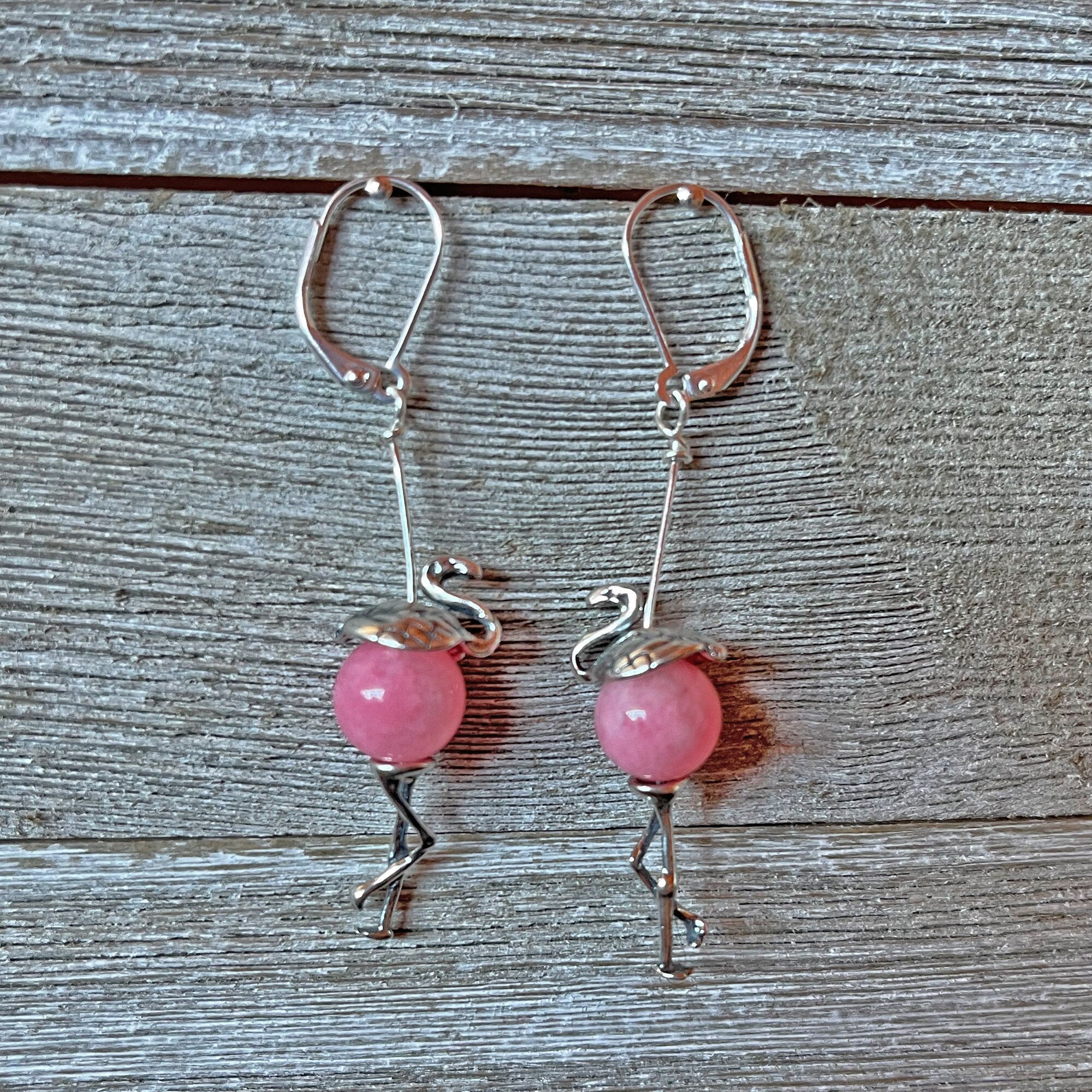 Close-up of Funny Pink Flamingo Earrings showcasing the detailed craftsmanship and pink quartz centers, ideal for flamingo lovers.