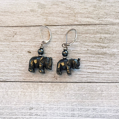 Dangle drop Elephant Earrings - Black Hematite with elephants representing strength and good luck, handmade jewelry by Enlivenadorn.