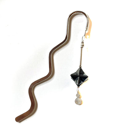 Sacred Geometry Merkaba Bookmark with Hematite showcasing its intricate design, perfect for readers seeking energy balance.