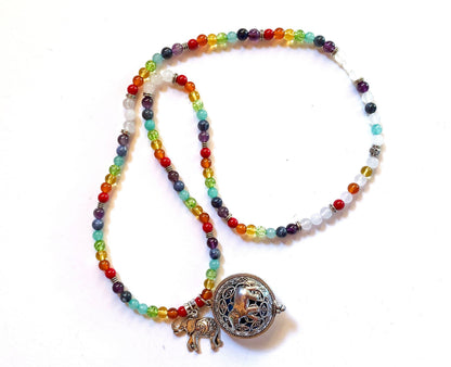 Aromatherapy Jewelry for Zen and Relaxation - Rainbow Quartz Mala Necklace displayed on a soft background, showcasing its vibrant colors.