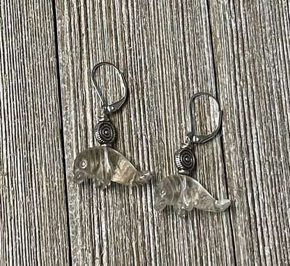 Manatee Earrings featuring clear quartz drop design, carved stone manatee jewelry, perfect ocean-themed gift for ocean lovers.