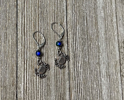 Color Changing Crab Dangle Earrings worn by a model, illustrating their cute and playful style for ocean lovers.