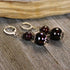 Sacred Geometry Garnet Earrings featuring artisan handmade design with sterling silver lever back earwires.