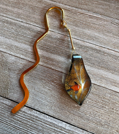 Close-up of the Art Glass and Carnelian Oval Hook Bookmark highlighting its unique hook design and vibrant colors.