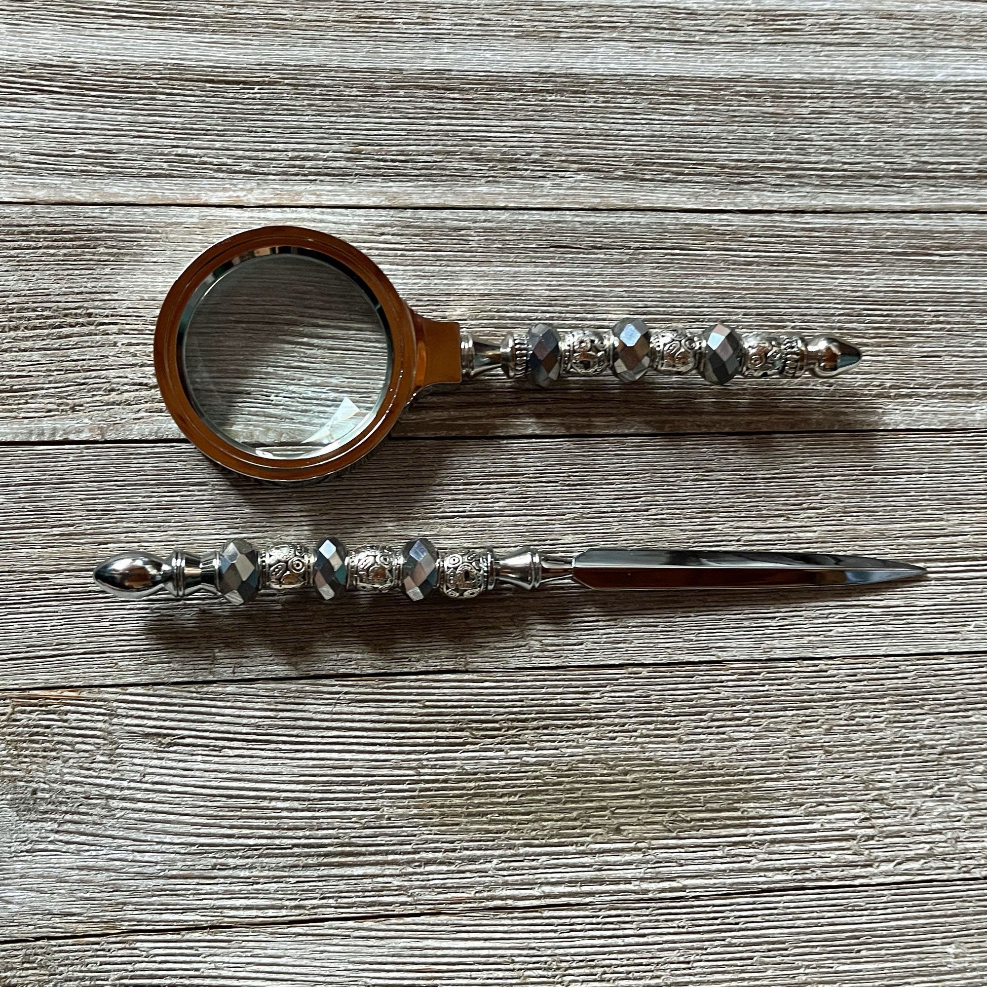 Silver Desk Set with Magnifying Glass and Letter Opener - Elegant office decor featuring silver faceted bead handle and intricate design.