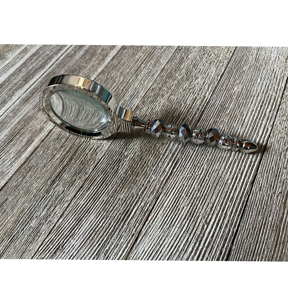 Silver Desk Set with Magnifying Glass and Letter Opener - Detailed view of the elegant silver faceted bead handle on the magnifying glass.