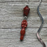 Divine Feminine Goddess Bookmark featuring Red Jasper, a carved zen aesthetic page holder that embodies woman power and enhances your reading experience.
