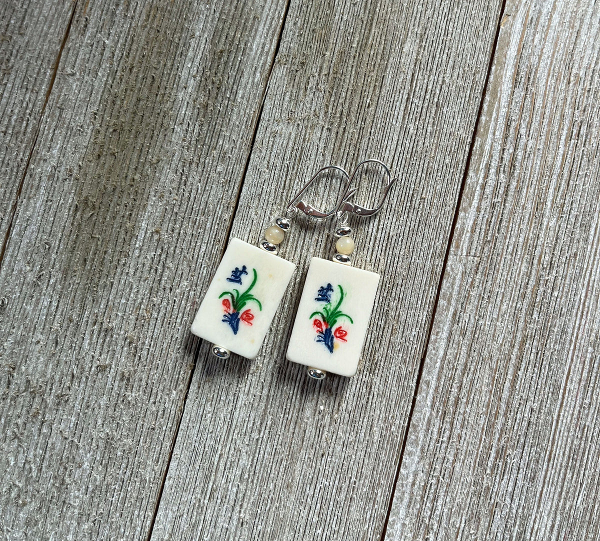 Mahjong Tile Earrings with a focus on wind tile motifs, including north and south directions, part of the game&