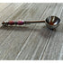 The Color-Changing Beaded Scoop: Herb, Bath Salt, Coffee Spoon—with purple and silver accents and an ornate handle—rests on a rustic wooden surface, making it a unique astrology gift or spiritual ritual tool.