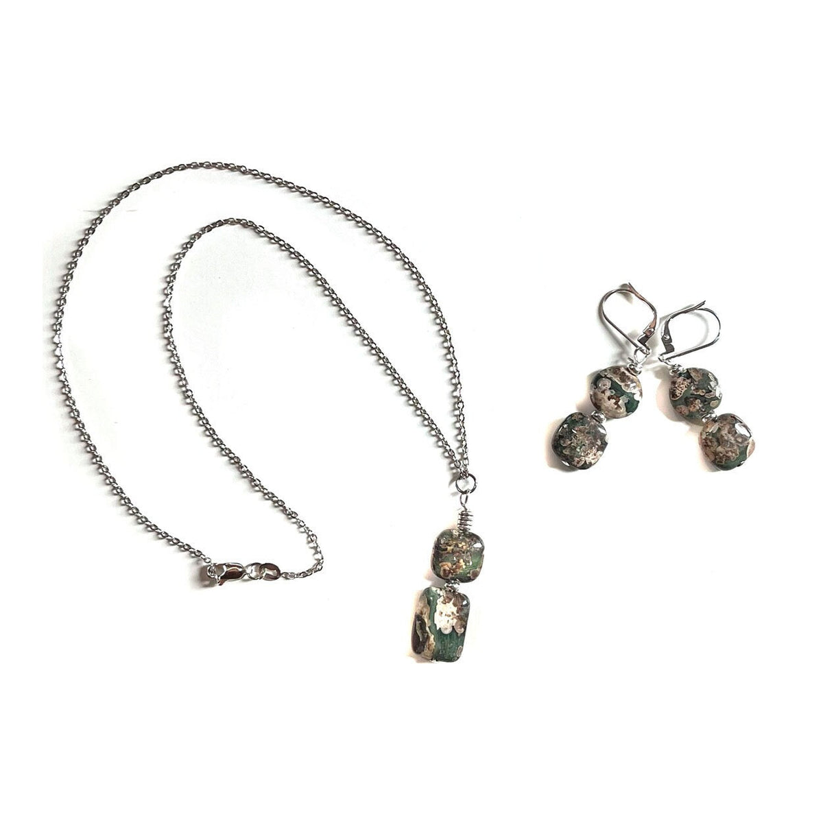 Rainforest Rhyolite Jewelry Set - close-up of the unique stone textures and colors in the necklace and earrings, designed for nature lovers and a one-of-a-kind gift.