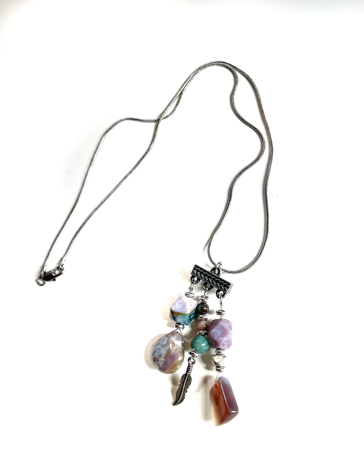 Fancy Jasper Triple Charm Pendant Necklace featuring feather symbol, perfect for spirituality and minimalist design enthusiasts.