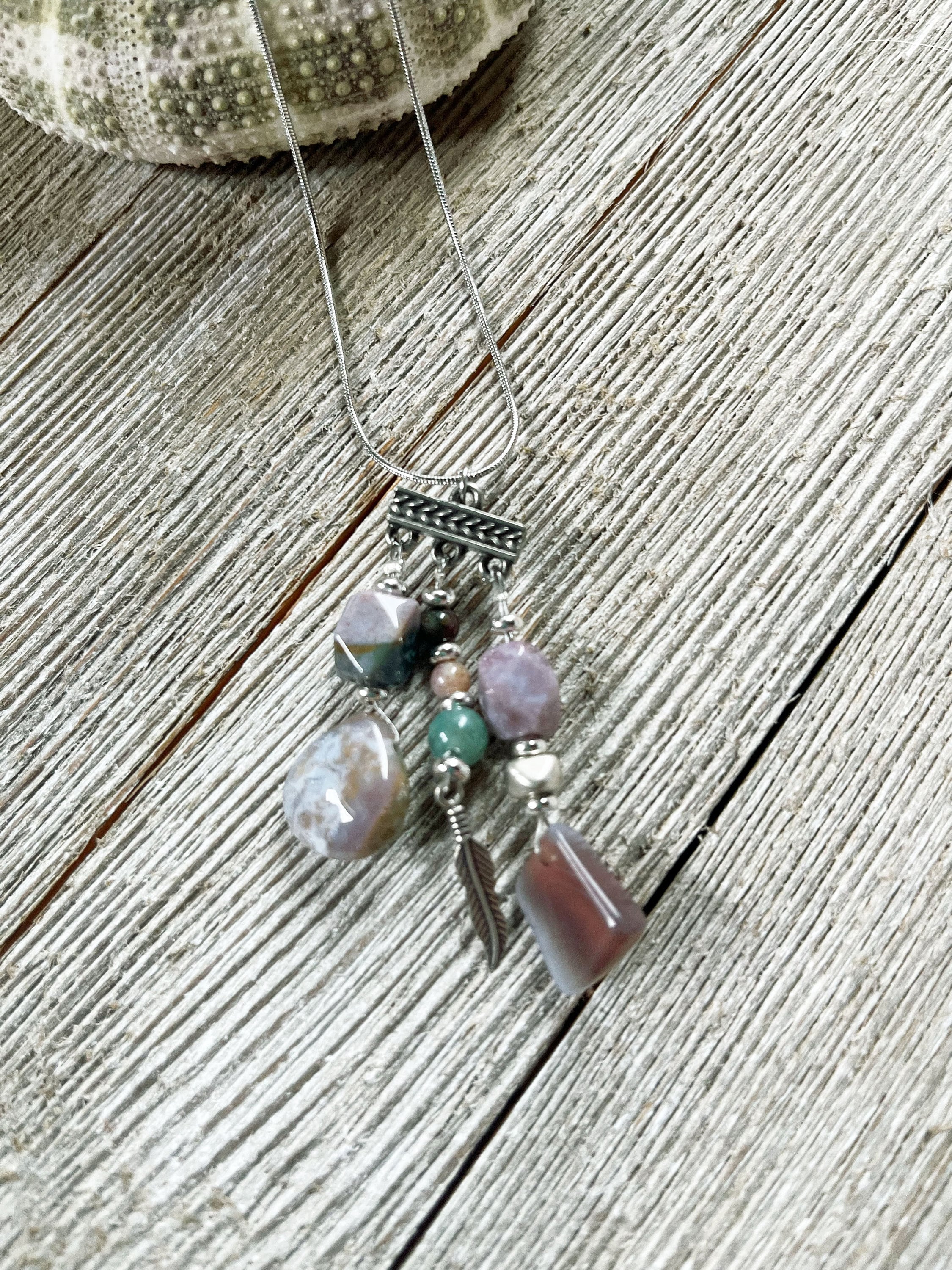 Fancy Jasper Triple Charm Pendant Necklace featuring a feather symbol, artisan made zen style jewelry with minimalist design.
