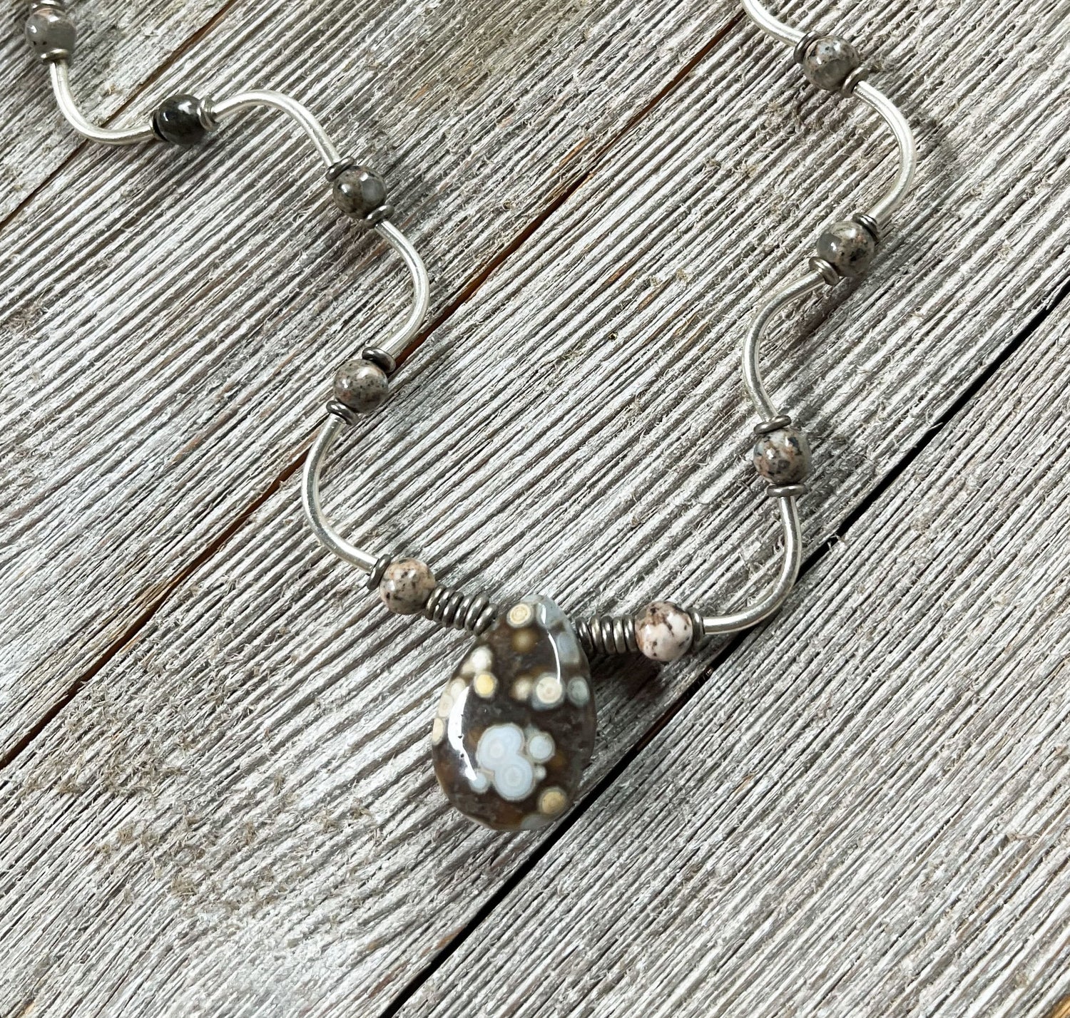 Ocean Jasper Tear Drop and Wavy Sterling Silver Jewelry Set featuring a stunning tear drop pendant and intricate wave patterns, ideal gift for self or nature lovers.