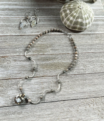 Model wearing Ocean Jasper Tear Drop and Wavy Sterling Silver Jewelry Set, showcasing its stylish design suitable for any occasion.