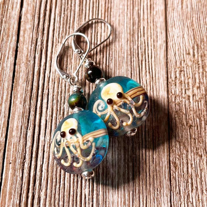 Close-up of Octopus Earrings showcasing intricate lamp-worked glass craftsmanship and playful octopus design, a unique piece of cephalopod jewelry.