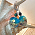 Beautiful Octopus Earrings, cephalopod jewelry gift featuring handcrafted blue art glass with detailed design and googly eyes, perfect gift for sea life lovers.