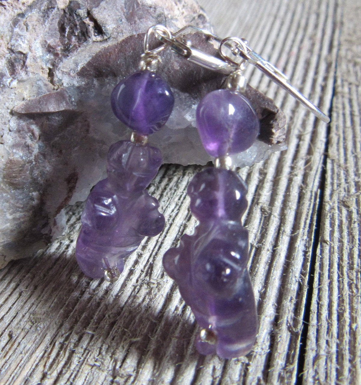 Close-up of Purple Stone Venus earrings, showcasing the intricate detailing of the Goddess of Willendorf figure, perfect for a unique jewelry gift.