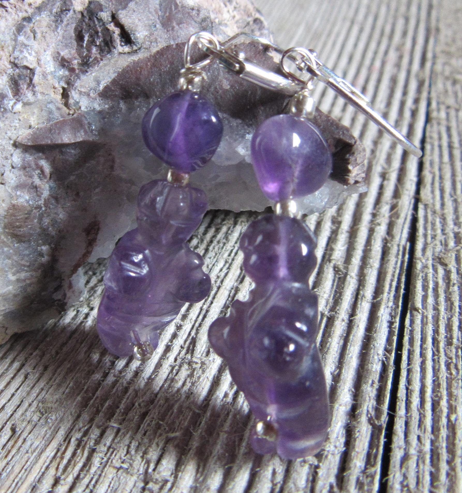 Close-up of Purple Stone Venus earrings, showcasing the intricate detailing of the Goddess of Willendorf figure, perfect for a unique jewelry gift.