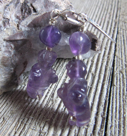 Close-up of Purple Stone Venus earrings, showcasing the intricate detailing of the Goddess of Willendorf figure, perfect for a unique jewelry gift.