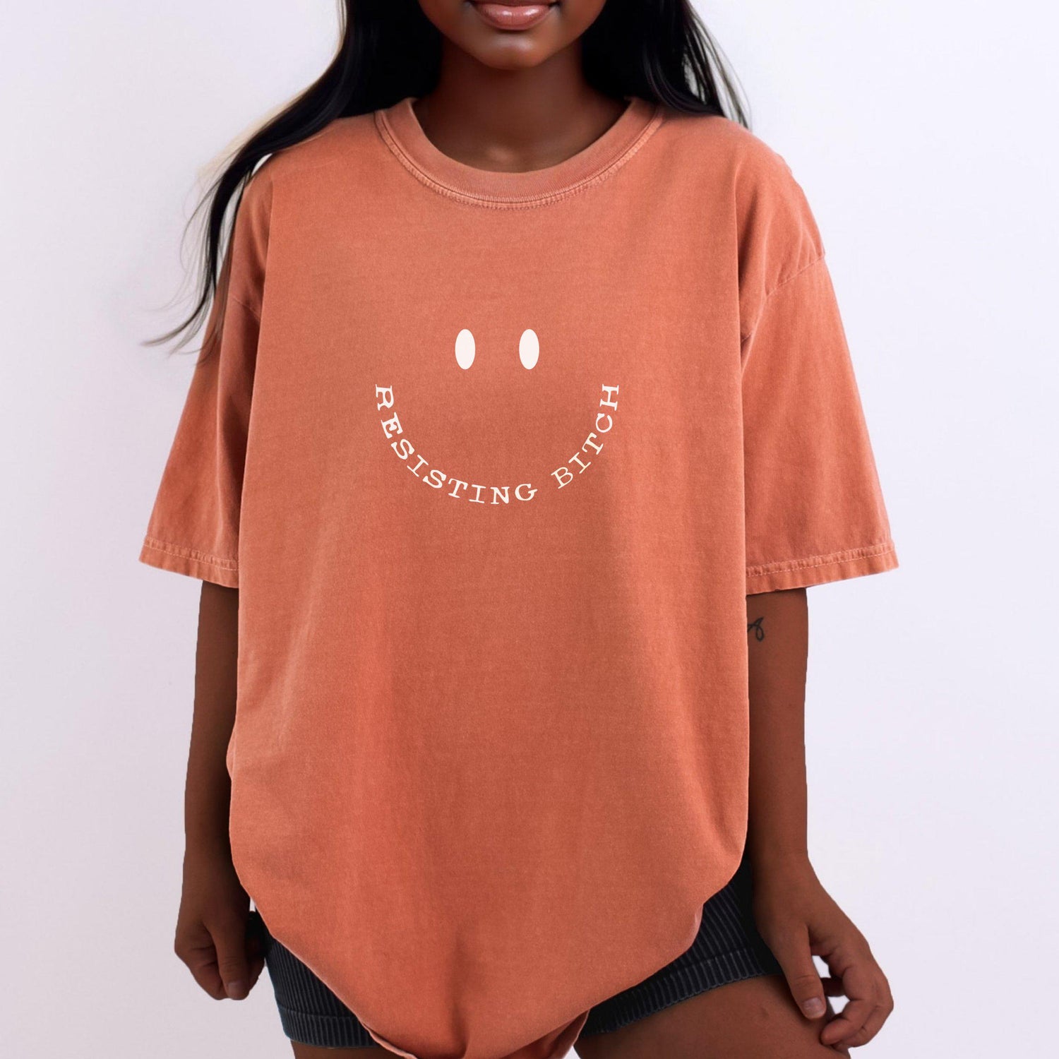 Resisting Bitch graphic tee, Trendy oversized shirt, Unique slogan t-shirt, Casual statement clothing, Funny smiley face top