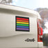 Square bumper magnet in rainbow blocks reading “Science is Real, Black Lives Matter, No Human is Illegal, Love is Love, Feminism is for Everyone, Kindness Always”