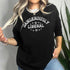 May include: Black sweatshirt with long sleeves and a crew neck.  The front features a white arched graphic that says &