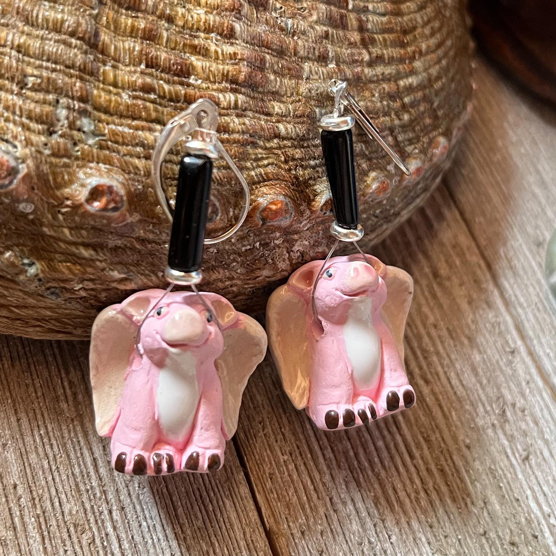 Funny When Pigs Fly earrings—a quirky handmade gift with pink flying pig charms, white wings, and black accents—are perfect for the whimsical friend who loves unique and funny accessories!.