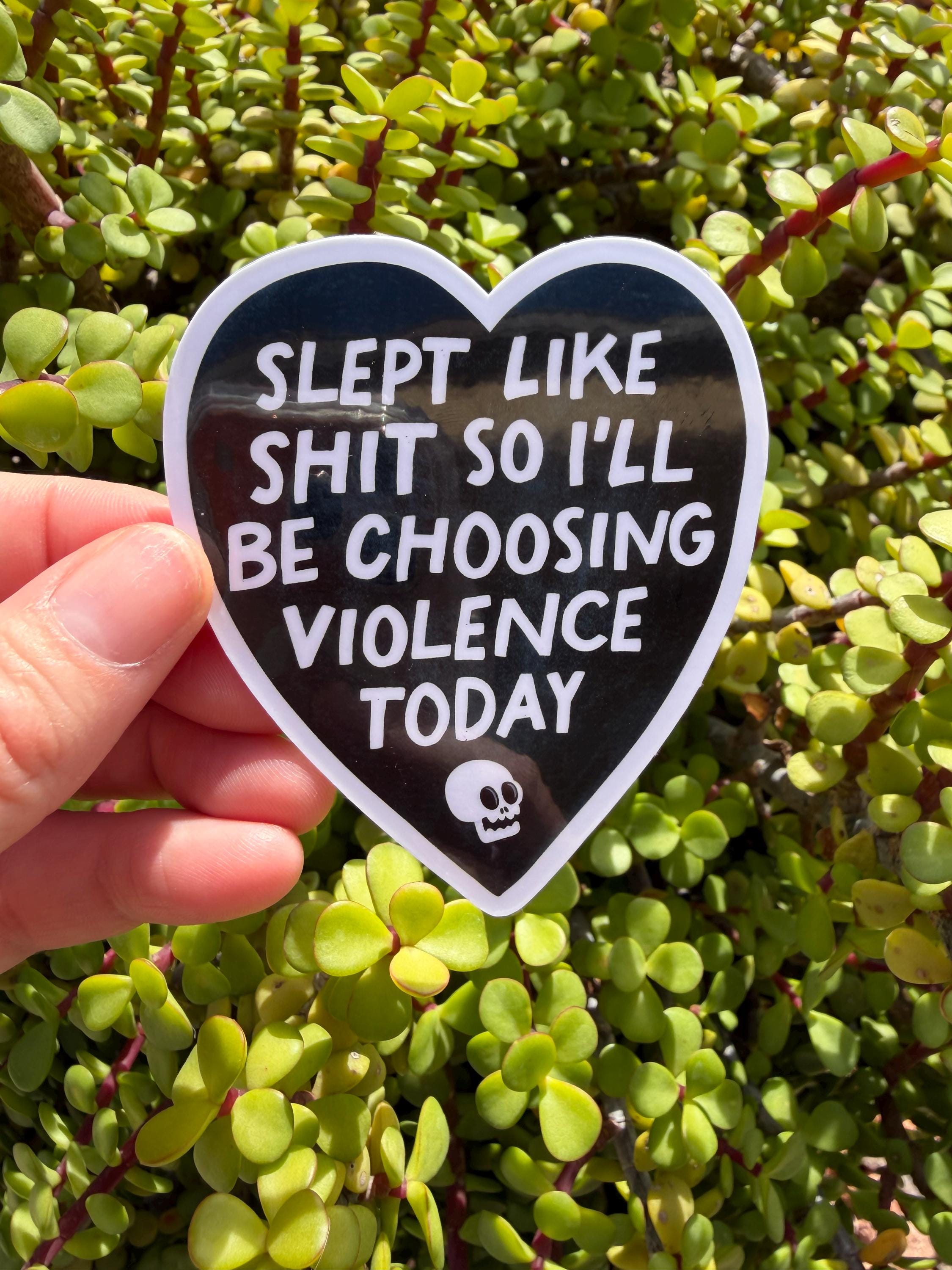 May include: A heart-shaped sticker with a black background and white text that reads &amp;quot;SLEPT LIKE SHIT SO I&amp;