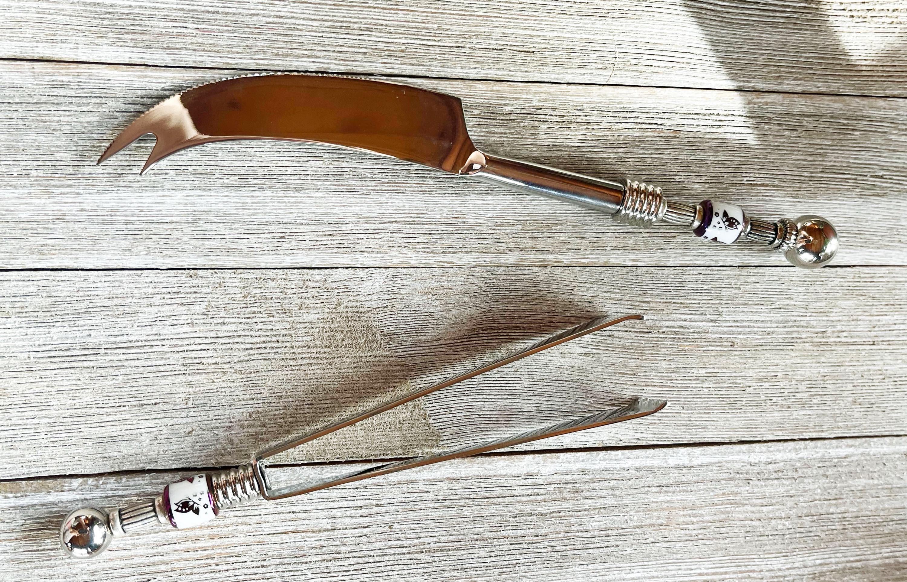 The Butterfly Beaded Cheese Server Set, Party Charcuterie Tools features a decorative cheese knife and tongs—an elegant addition to your charcuterie serving set or cheese board accessories.