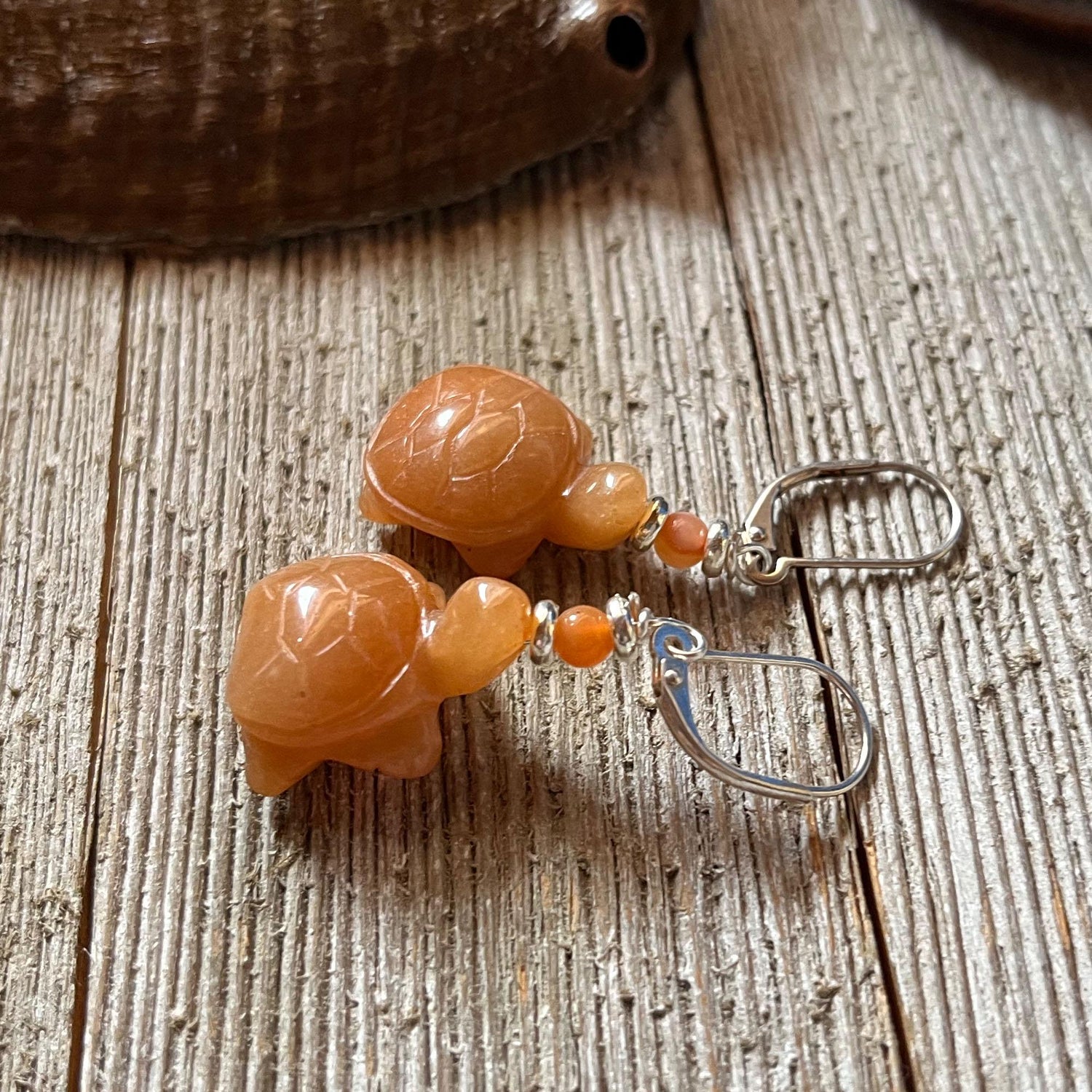 The Turtle earrings and necklace jewelry set is a perfect gift for tortoise lovers, featuring small orange stone turtle earrings with silver hooks—a charming addition to any jewelry collection.