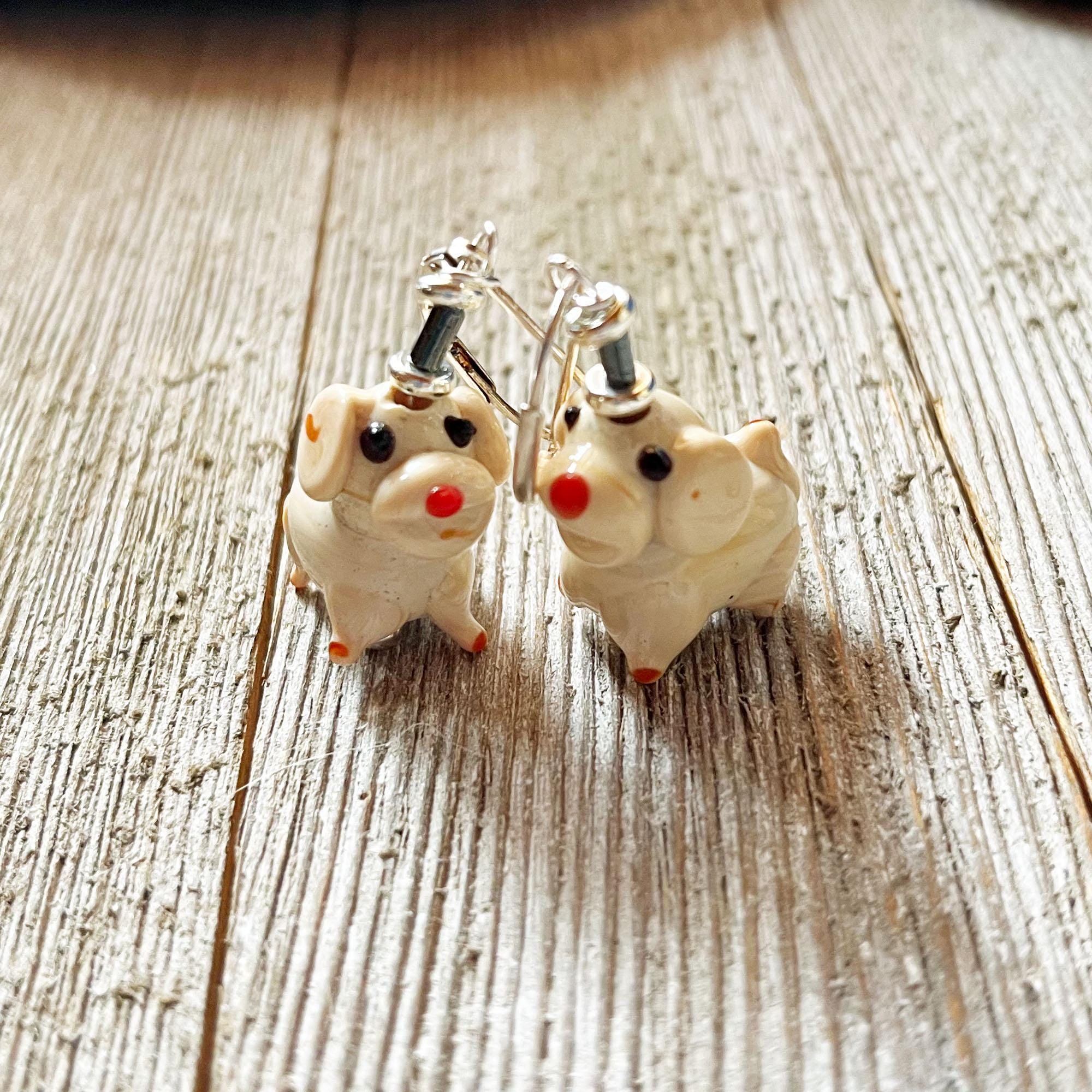 The Potato Dog Jewelry Set features funny puppy earrings and a necklace, with cream-colored dog designs sporting red noses and black eyes—a delightful gift for any dog lover.
