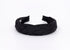 A black braided headband made of linen fabric.