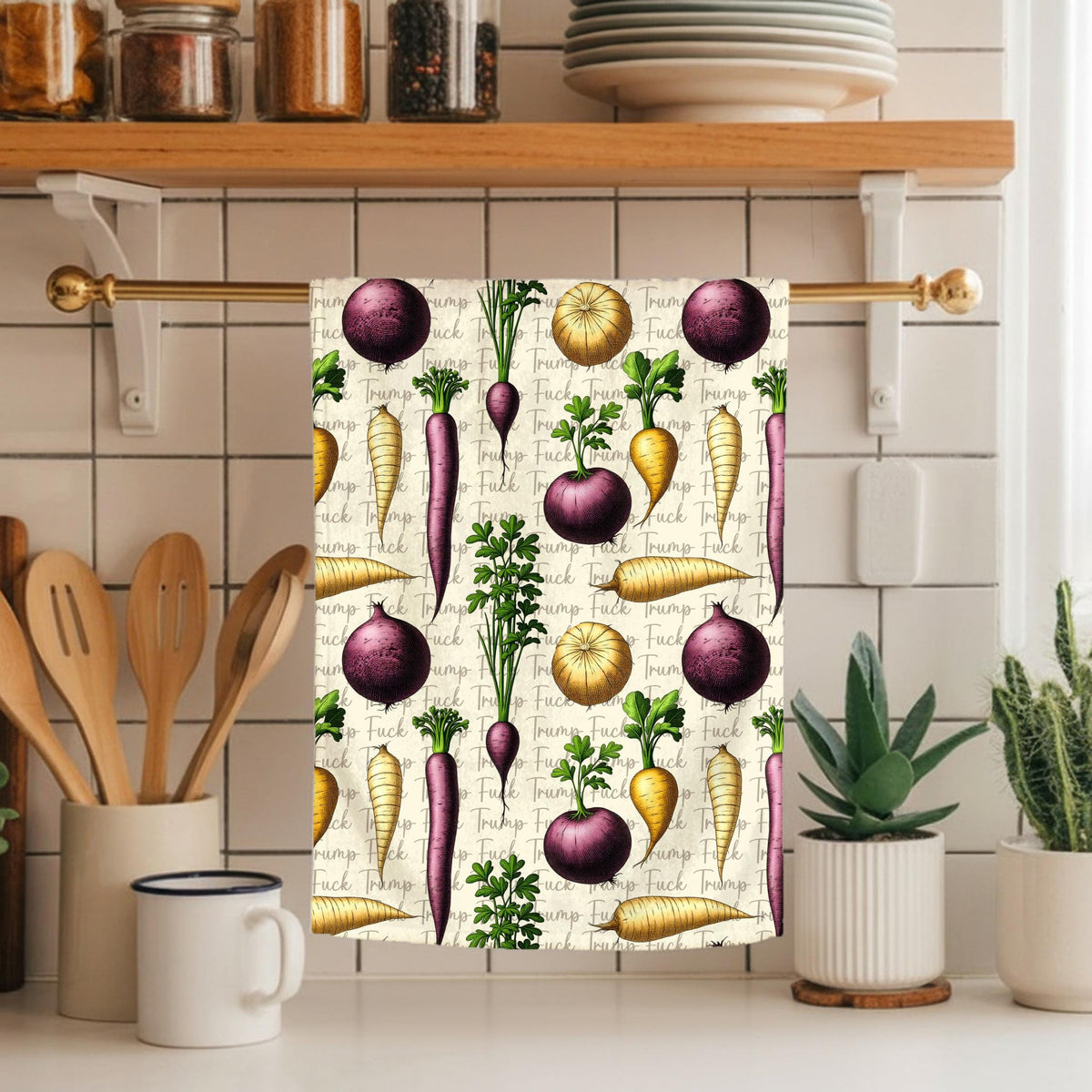 Vegetable pattern towel with carrots, onions, and pumpkins.