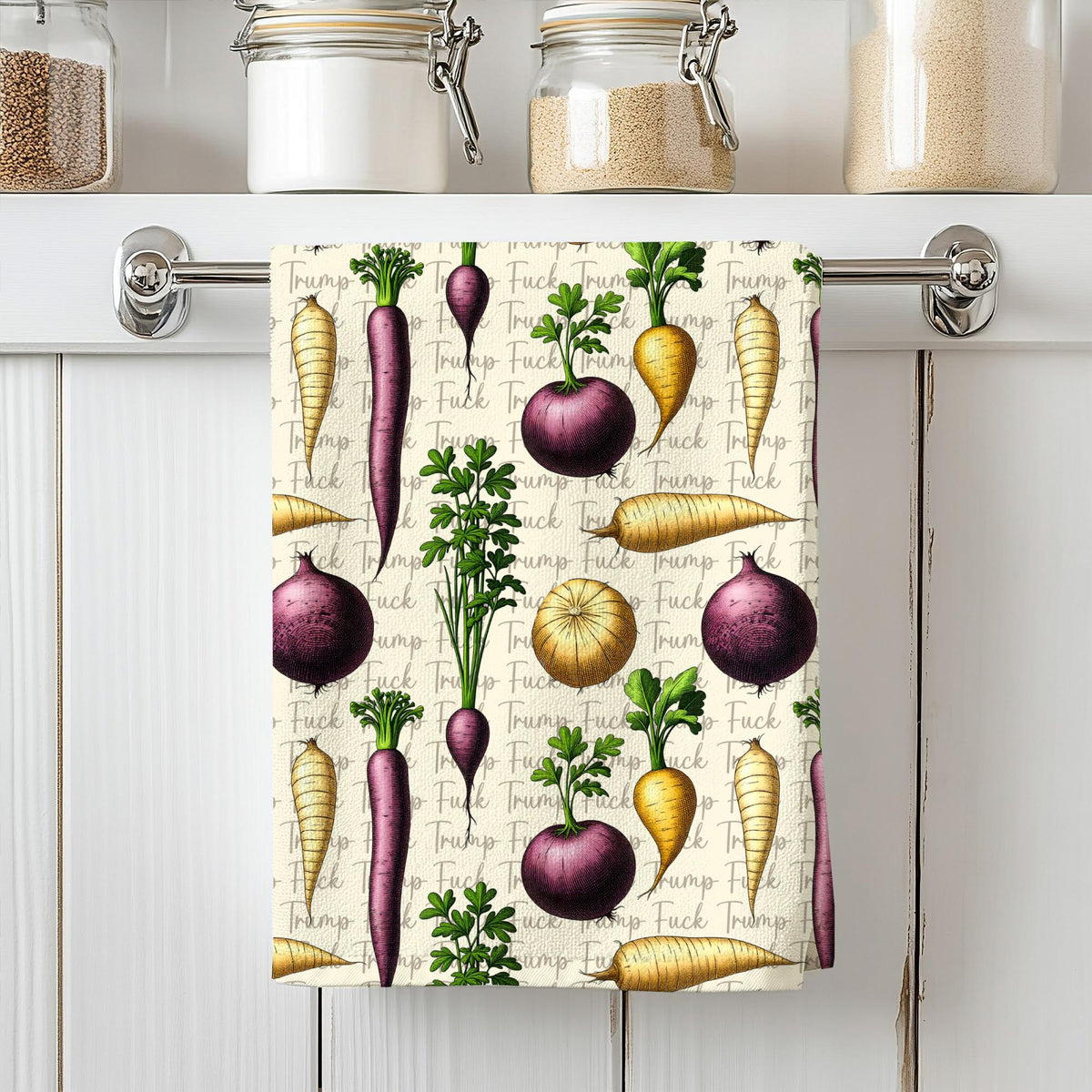 Towel with pattern of vegetables and text including &amp;quot;Trump&amp;quot; and &amp;quot;Fuck&amp;quot;.