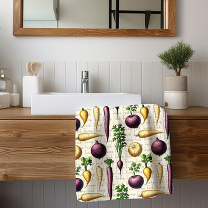 Towel with a repeating pattern of carrots, radishes, and onions.