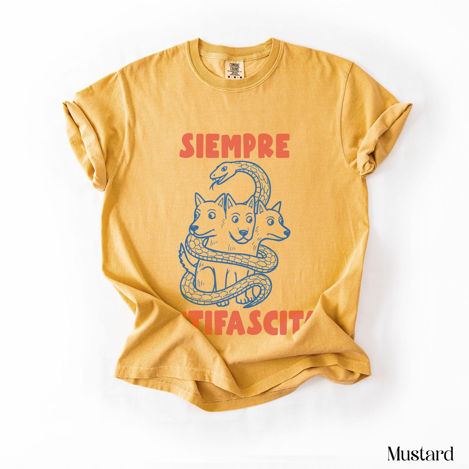 Mustard yellow t-shirt with three-headed dog design and text &amp;quot;SIEMPRE TIFASCIST&amp;quot;.