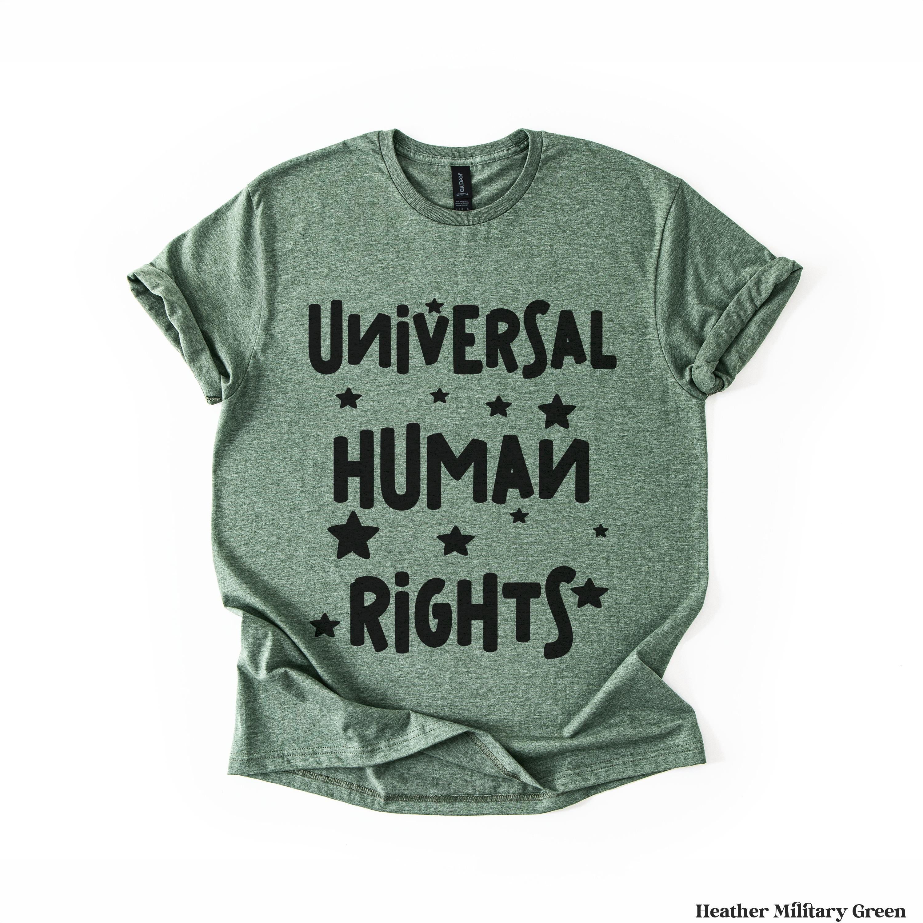 Green t-shirt with &amp;quot;Universal Human Rights&amp;quot; and stars in black text.
