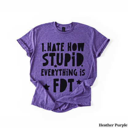 Purple t-shirt with text &amp;quot;I HATE HOW STUPID EVERYTHING IS FDT&amp;quot; and stars.