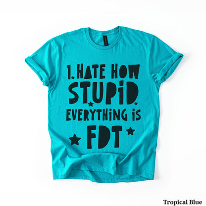 Turquoise t-shirt with black text &amp;quot;I hate how stupid everything is FDT&amp;quot; and stars.