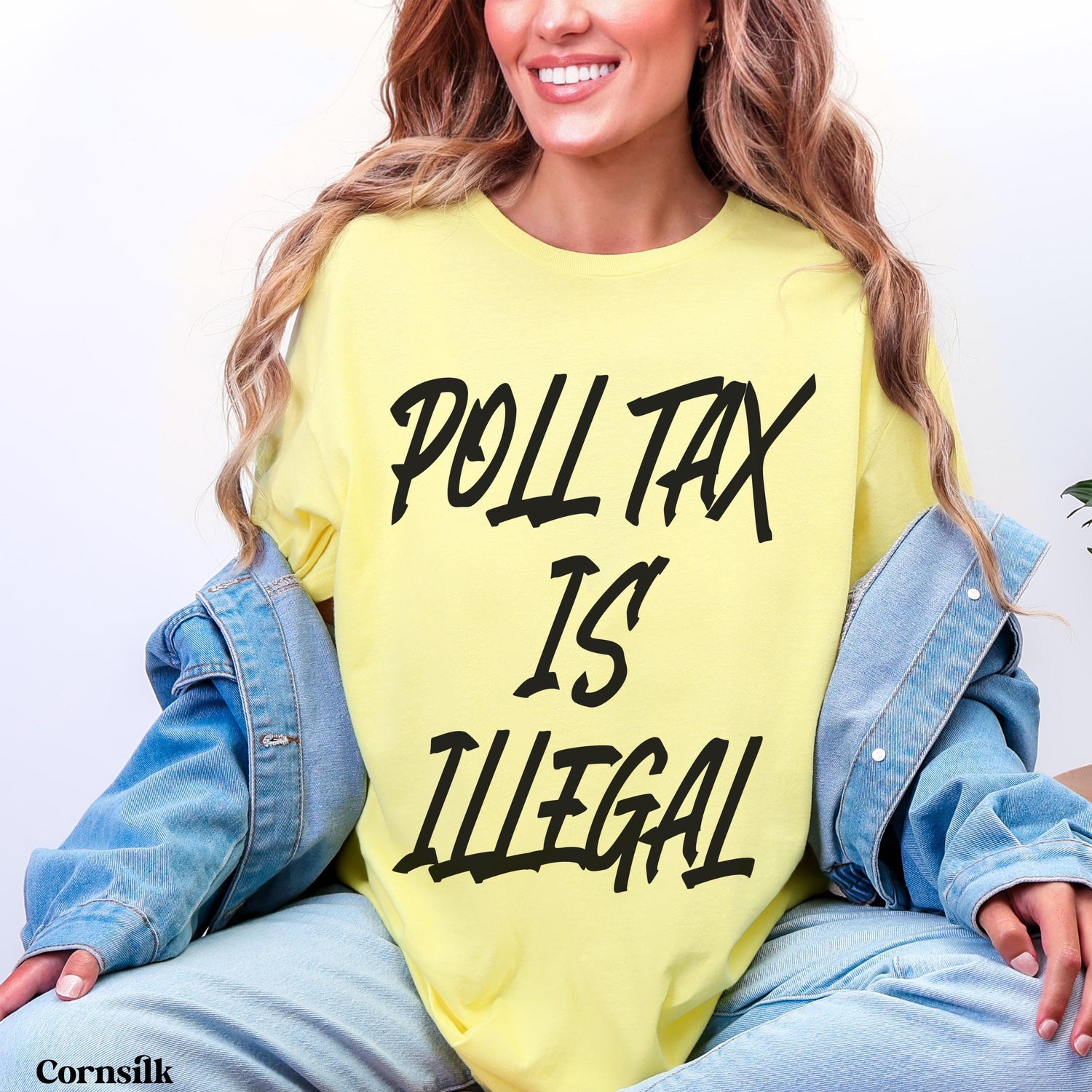 Yellow t-shirt with &amp;quot;POLL TAX IS ILLEGAL&amp;quot; text in black.
