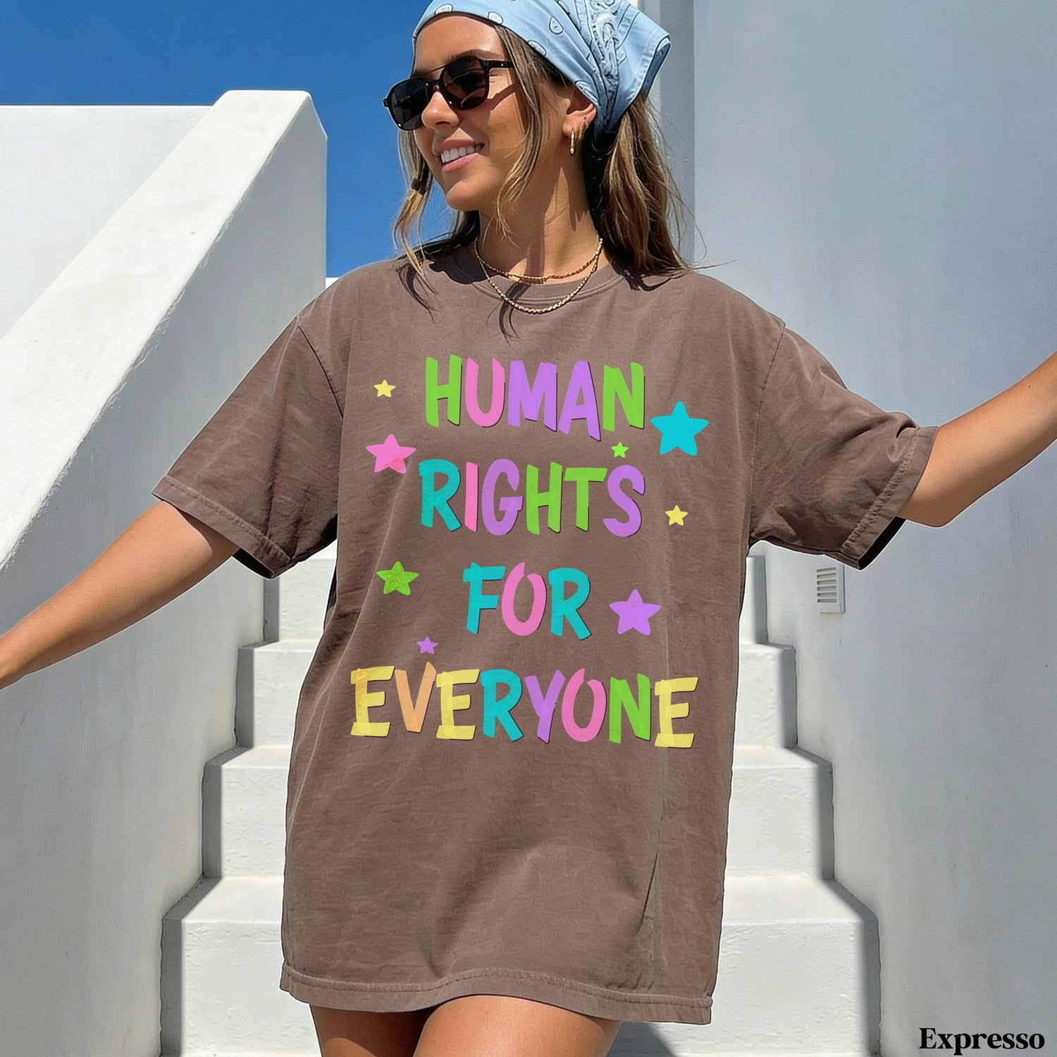 Brown t-shirt with &amp;quot;HUMAN RIGHTS FOR EVERYONE&amp;quot; text and colorful stars.