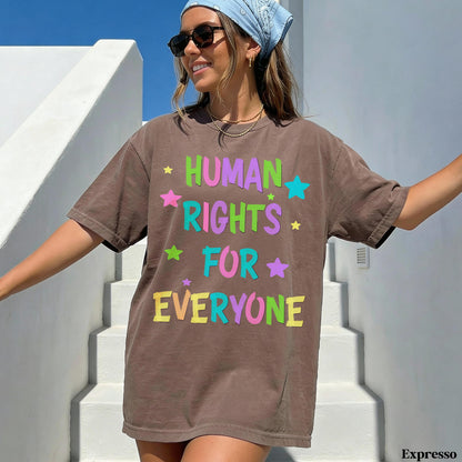 Brown t-shirt with &amp;quot;HUMAN RIGHTS FOR EVERYONE&amp;quot; text and colorful stars.