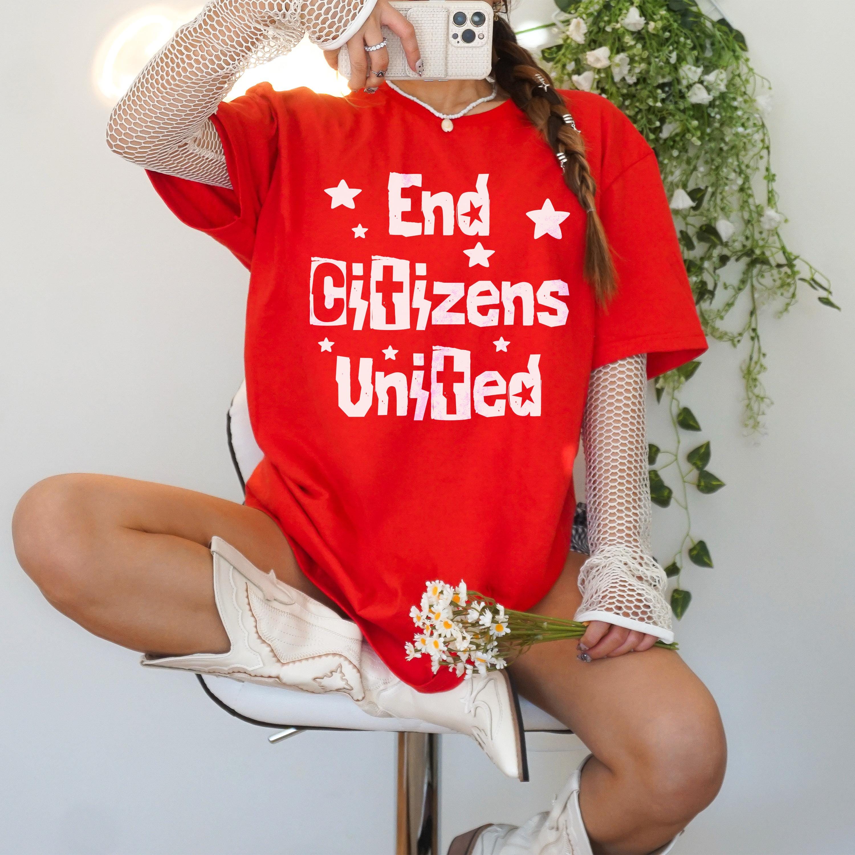 Red t-shirt with &amp;quot;End Citizens United&amp;quot; text, worn by a person with white boots.