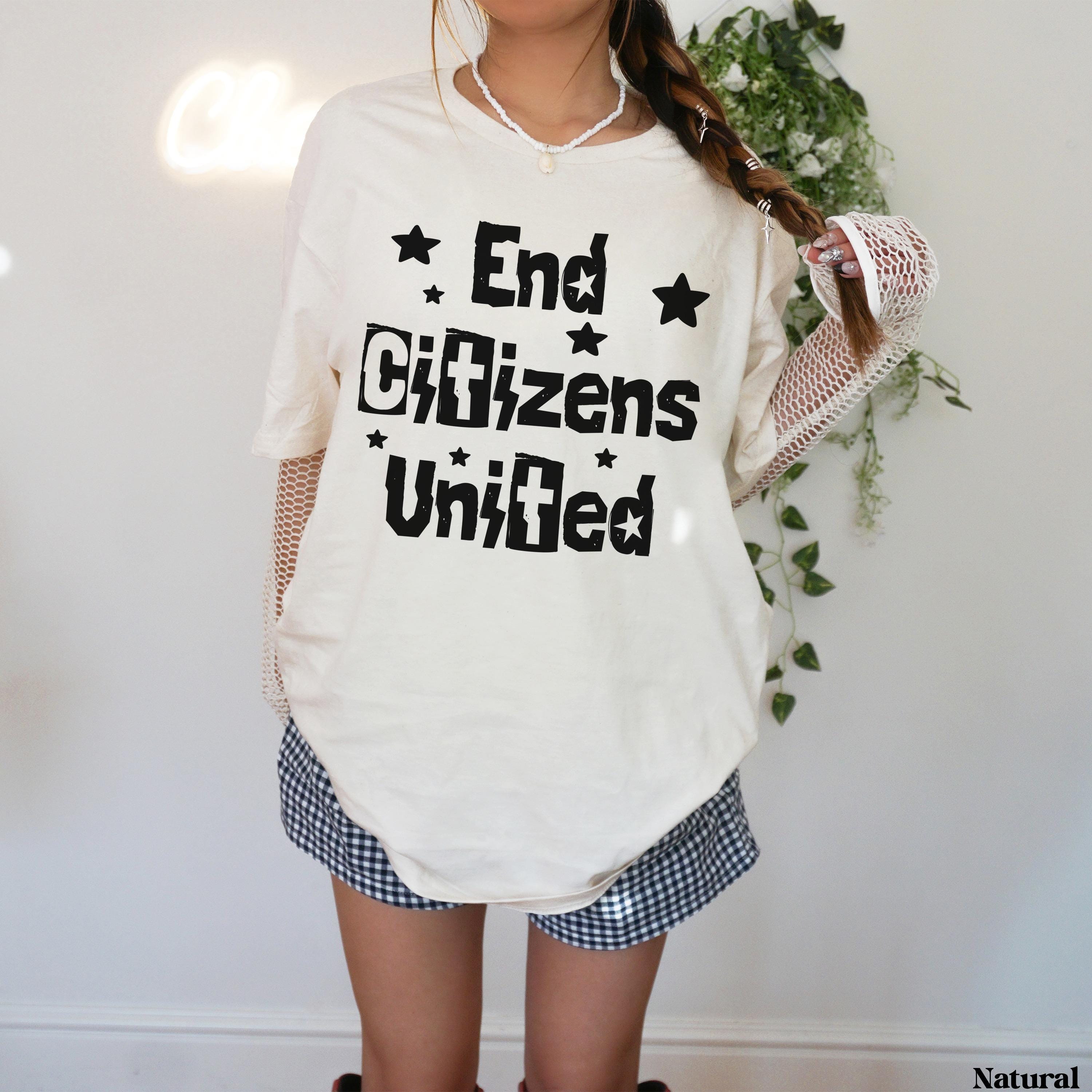 Cream t-shirt with black &amp;quot;End Citizens United&amp;quot; text and stars, worn by a person.