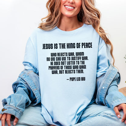 Light blue t-shirt with quote from Pope Leo XIU about Jesus and war.