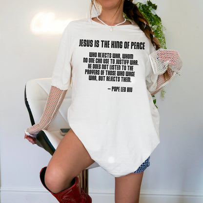Cream t-shirt with &amp;quot;Jesus is the King of Peace&amp;quot; quote.