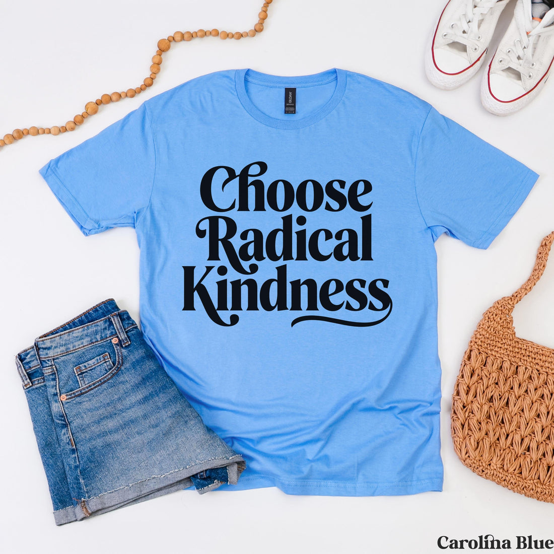 Light blue t-shirt with &amp;quot;Choose Radical Kindness&amp;quot; in black script lettering.