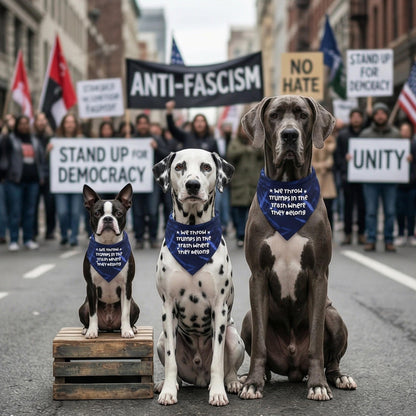 Three dogs wear bandanas saying &amp;quot;We throw Trumps in the trash&amp;quot;.