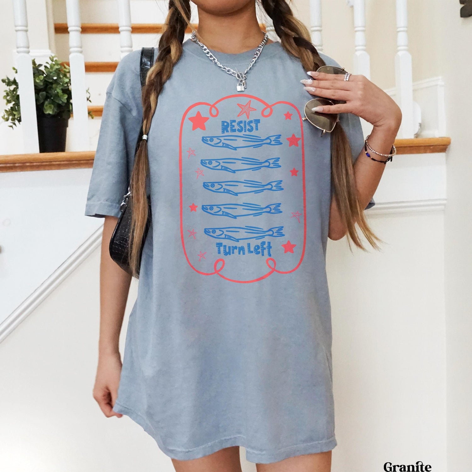 Gray t-shirt with fish graphic and &amp;quot;Resist Turn Left&amp;quot; text.