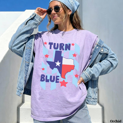 Purple t-shirt with Texas flag and &amp;quot;Turn Blue&amp;quot; text.